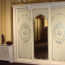 Overview of wardrobes implemented in a classic style, the nuances of choice