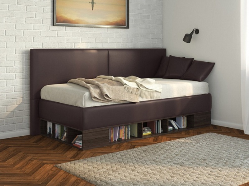 Single bed for a child with bookcase shelves