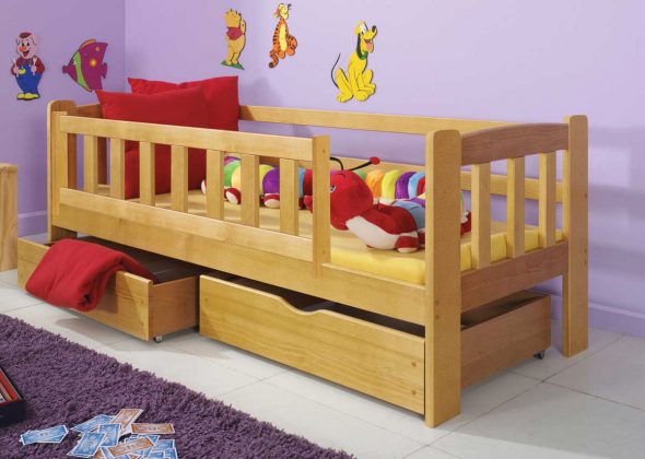 Comfortable bed with wooden sides