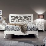 With carved headboard