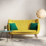 Sofa with green pillows